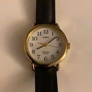 Timex white medium sized face n black straps